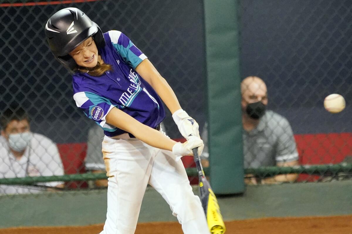 Texas' Ella Bruning connects for an RBI-single against Washington on Aug. 20 in South Williamsport, Pa.