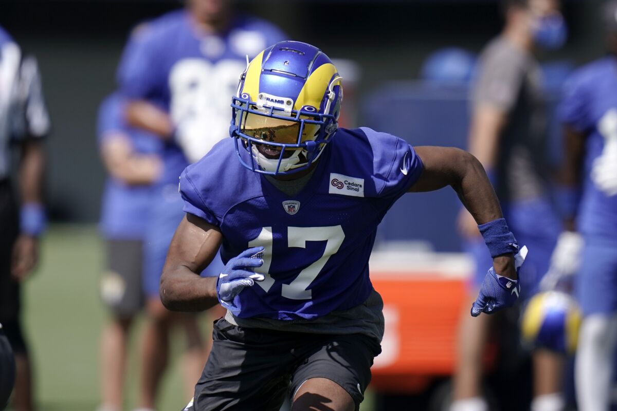 Rams wide receiver Robert Woods runs during a practice drill in August.