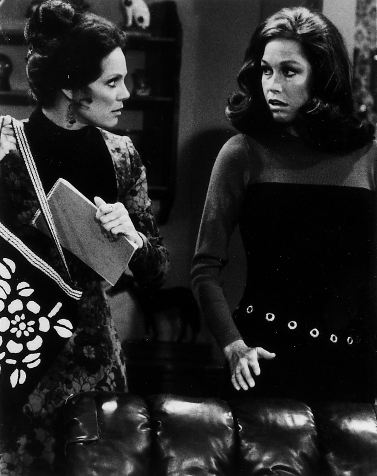 Two women face each other with surprised looks in "The Mary Tyler Moore Show."