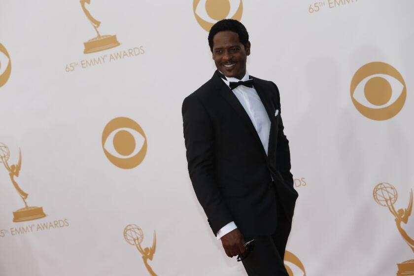 Blair Underwood arrives at the 2013 Emmy Awards at the Nokia Theatre.