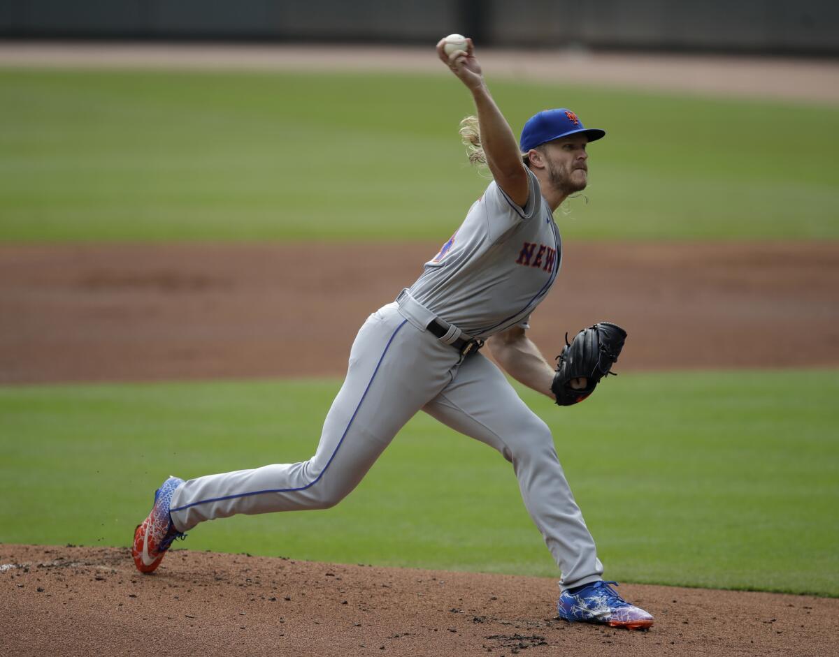 Mets starting pitcher Noah Syndergaard(Thor) throws the first pitch