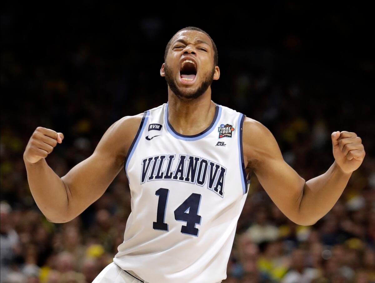 Villanova forward Omari Spellman celebrates during the first half against Kansas in the semifinals.