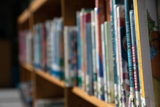 STAMFORD, CONNECTICUT - AUGUST 31: Bookshelves of library books stand reflected in the media center of the Newfield Elementary School on August 31, 2020 in Stamford, Connecticut. The school library, like many around the U.S., will be largely closed to students due to the coronavirus pandemic. Stamford Public Schools is opening the fall semester using a hybrid model, although many families have chosen the distance-learning option. (Photo by John Moore/Getty Images)