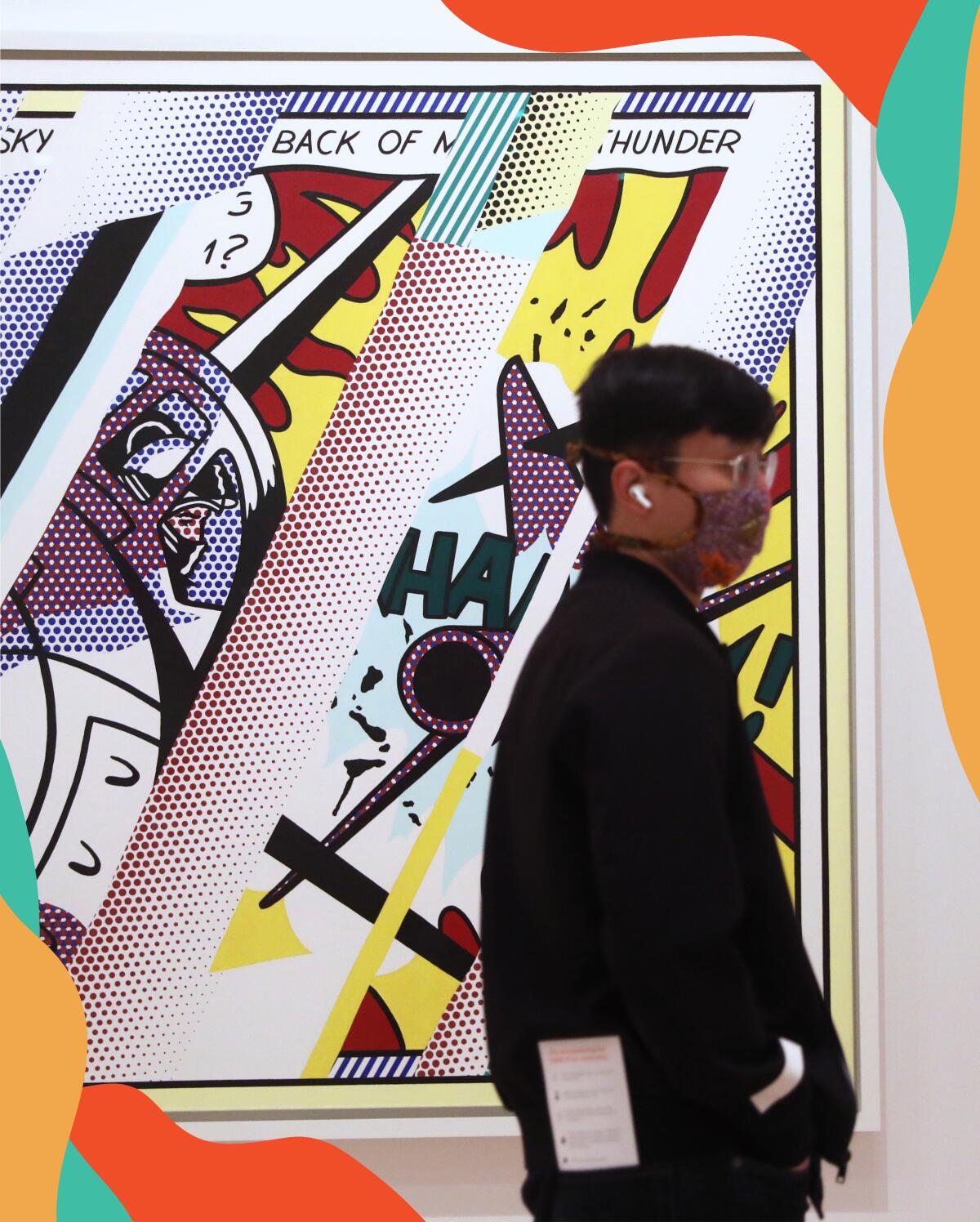 A masked person stands by the Roy Lichtenstein painting "Reflections: Whaam!" at the San Francisco Museum of Modern Art
