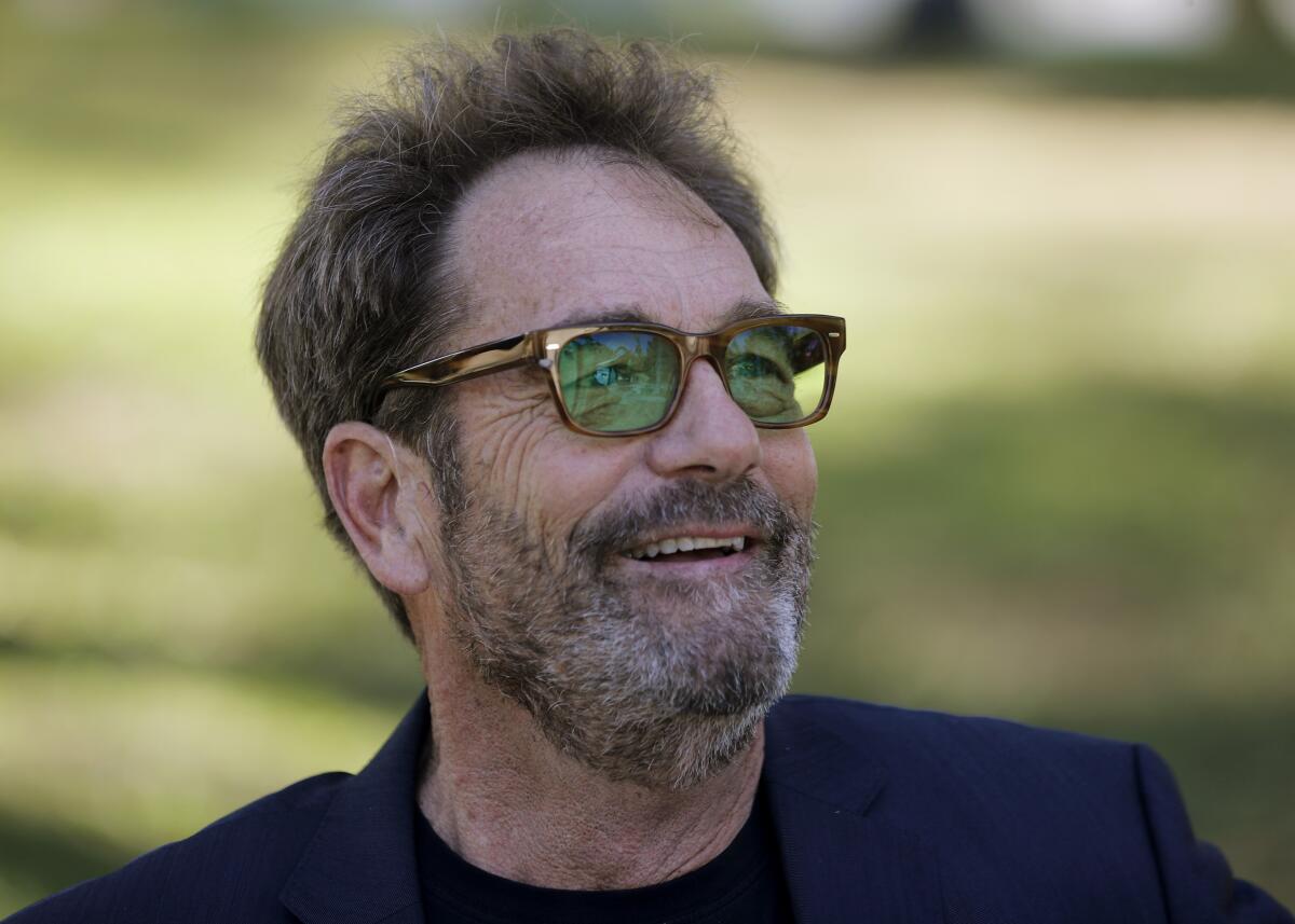 Huey Lewis 'can't enjoy music' anymore since he's 'basically deaf' - Los Angeles Times