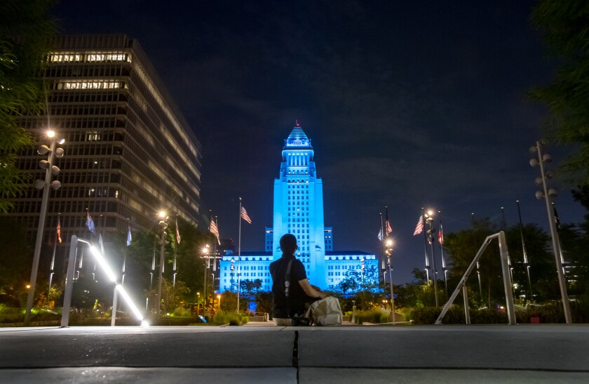 L.A. City Hall is lighted in Dodger blue Wednesday night to honor Vin Scully