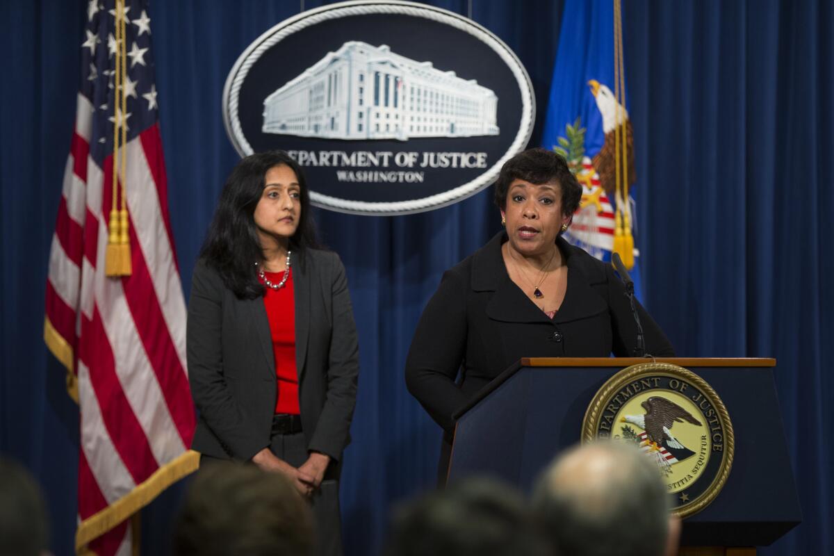 Vanita Gupta, left, head of the Justice Department's civil rights division, with Atty. Gen. Loretta Lynch.