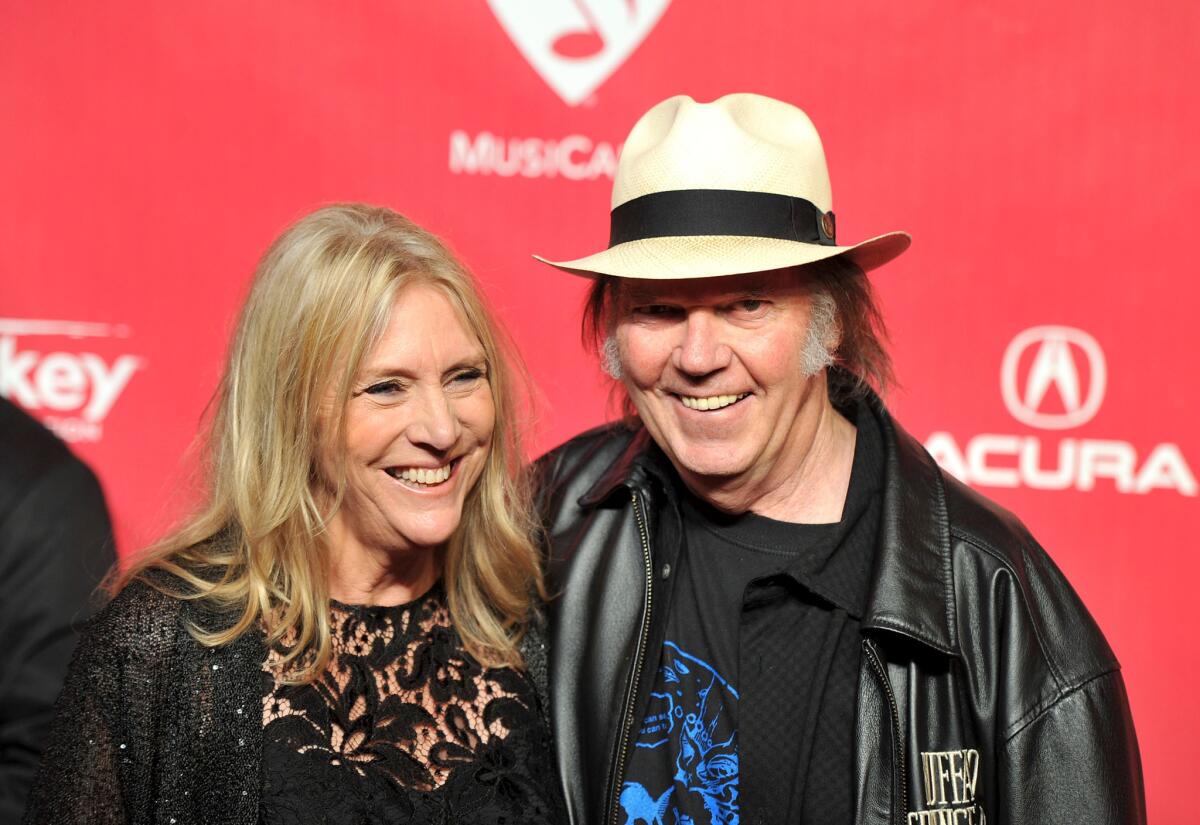 Pegi Young and Neil Young, shown in 2012, are divorcing after nearly 37 years of marriage.