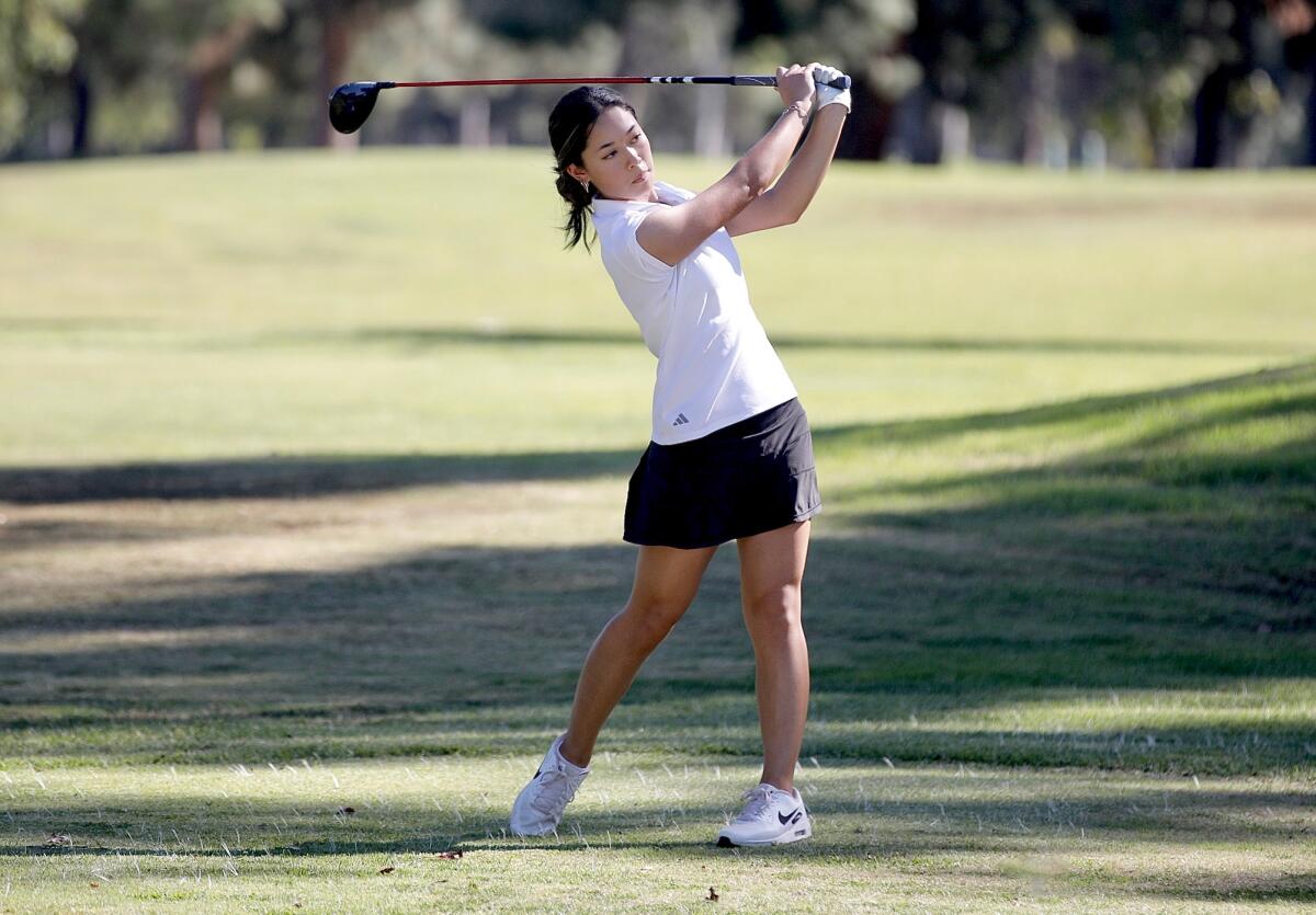 Palisades junior Anna Song hits from the 18th tee during the City Section Championships at Balboa Golf Course in Encino.