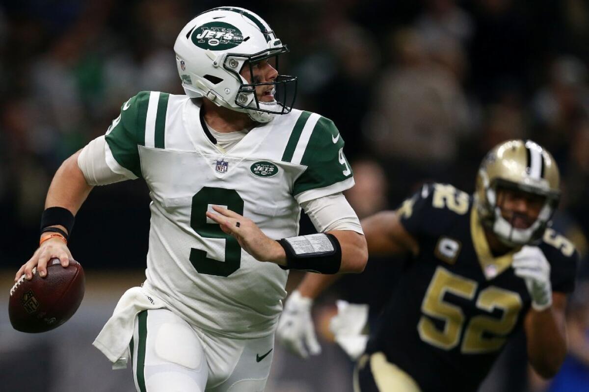 Jets quarterback Bryce Petty is chased out of the pocket by the Saints during a game on Dec. 17.