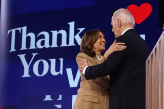 Chicago, Ill, Monday, August 19, 2024 - Vice President Kamala Harris embraces President Joe Biden after his speech at the Democratic National Convention at the United Center. (Robert Gauthier/Los Angeles Times)