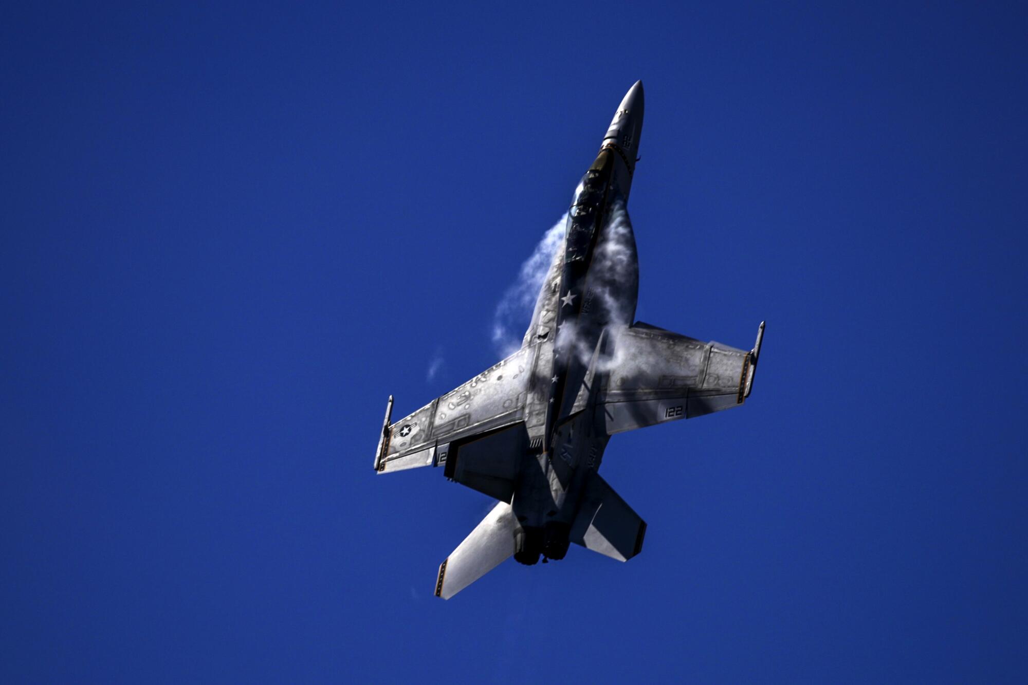  U.S. Navy F/A-18 Super Hornet on a vertical climb  