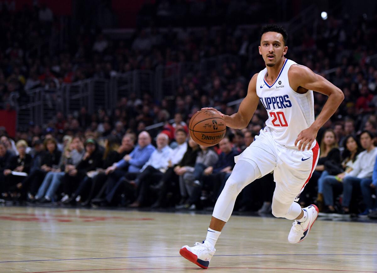 Clippers guard Landry Shamet works with the ball during a game against the Raptors on Nov. 11 at Staples Center.
