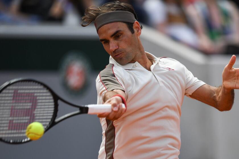 Switzerland's Roger Federer returns the ball to Norway's Casper Ruud during their men's singles third round match on day six of The Roland Garros 2019 French Open tennis tournament in Paris on May 31, 2019. (Photo by Christophe ARCHAMBAULT / AFP)CHRISTOPHE ARCHAMBAULT/AFP/Getty Images ** OUTS - ELSENT, FPG, CM - OUTS * NM, PH, VA if sourced by CT, LA or MoD **