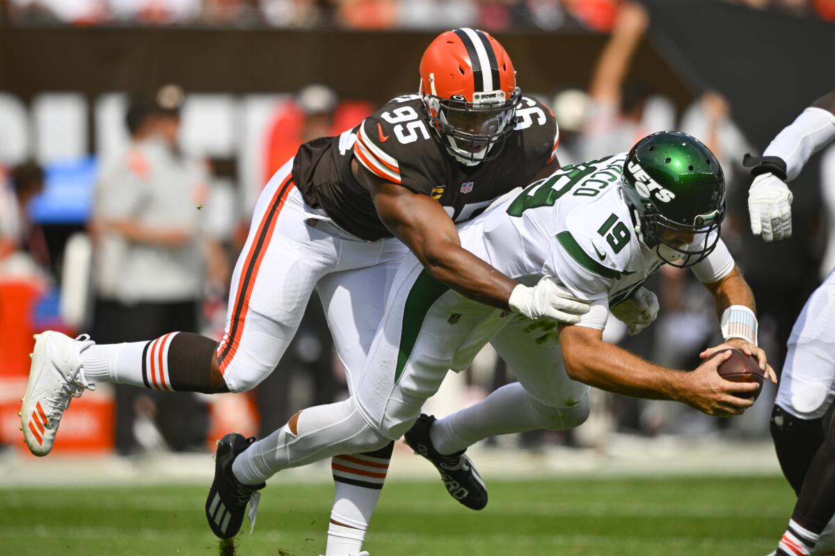 Joel Bitonio and 2 Cleveland Browns w/ down stock vs.Miami Dolphins