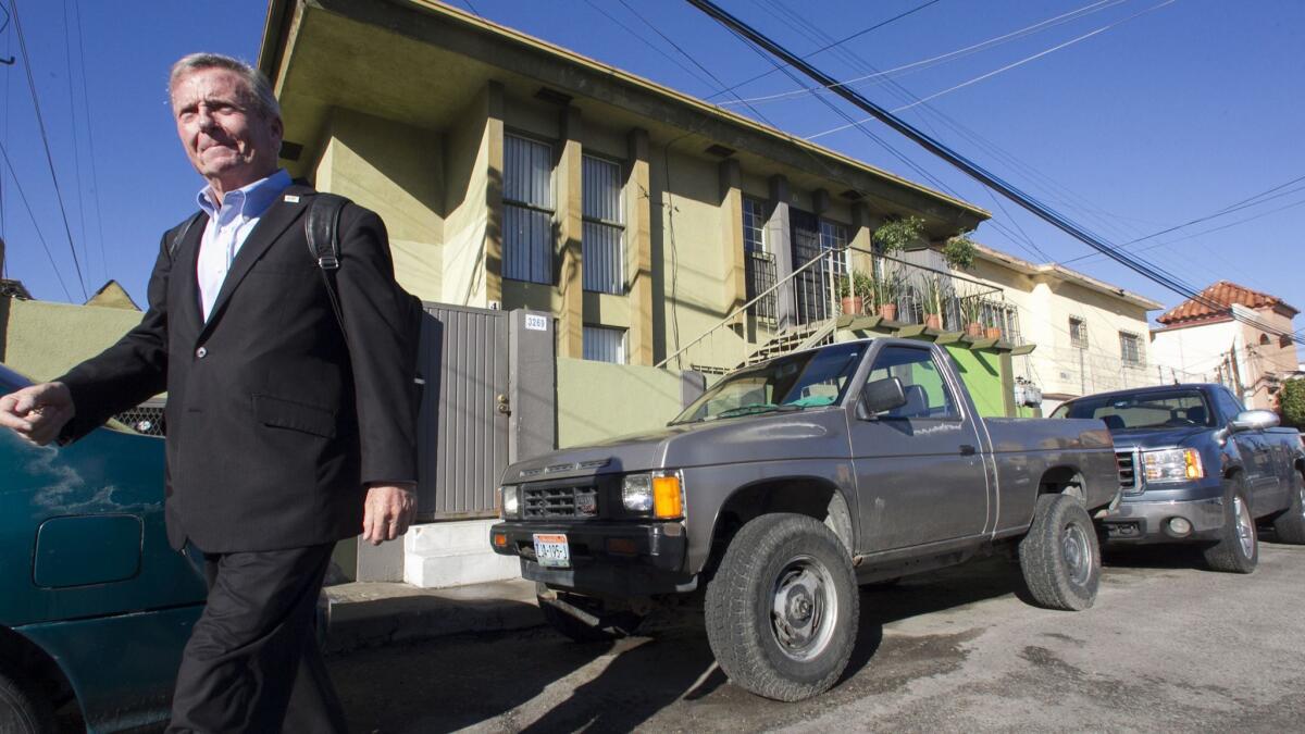 American Bob Morris left his two bedroom apartment in the complex behind him, located in the Gabilondo section of Tijuana, just south of downtown Tijuana, for his daily commute to San Diego.