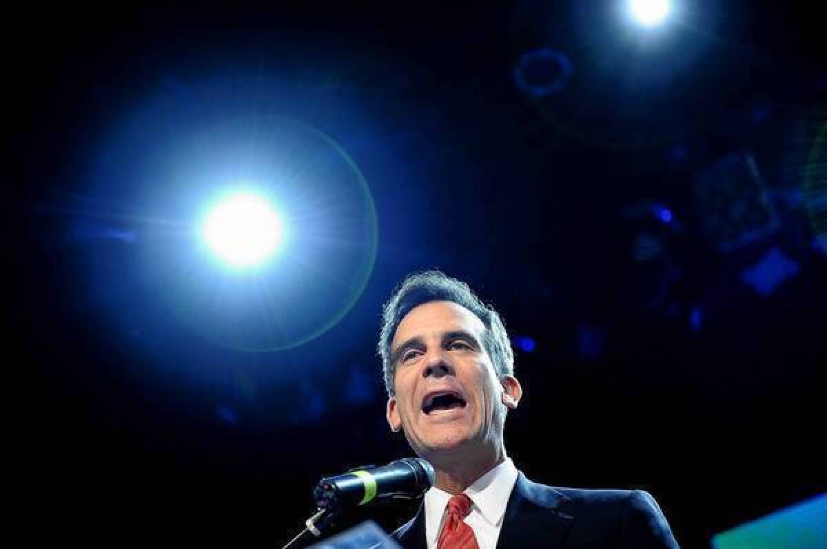 A 1998 agreement with Venoco promised L.A. mayoral candidate Eric Garcetti and several relatives a share of earnings from any oil or gas that the company extracts by slant drilling under the Wilshire Boulevard property from the high school about a half-mile away. Above, Garcetti talks to supporters.