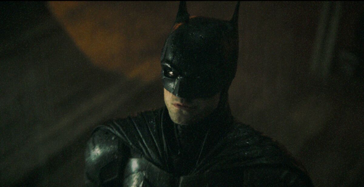 This image released by Warner Bros. Pictures shows Robert Pattinson in "The Batman." Warner Bros. released the first trailer for “The Batman,” which is Pattinson’s first film as the Dark Knight. It will be released March 4, 2022. (Warner Bros. Pictures via AP)
