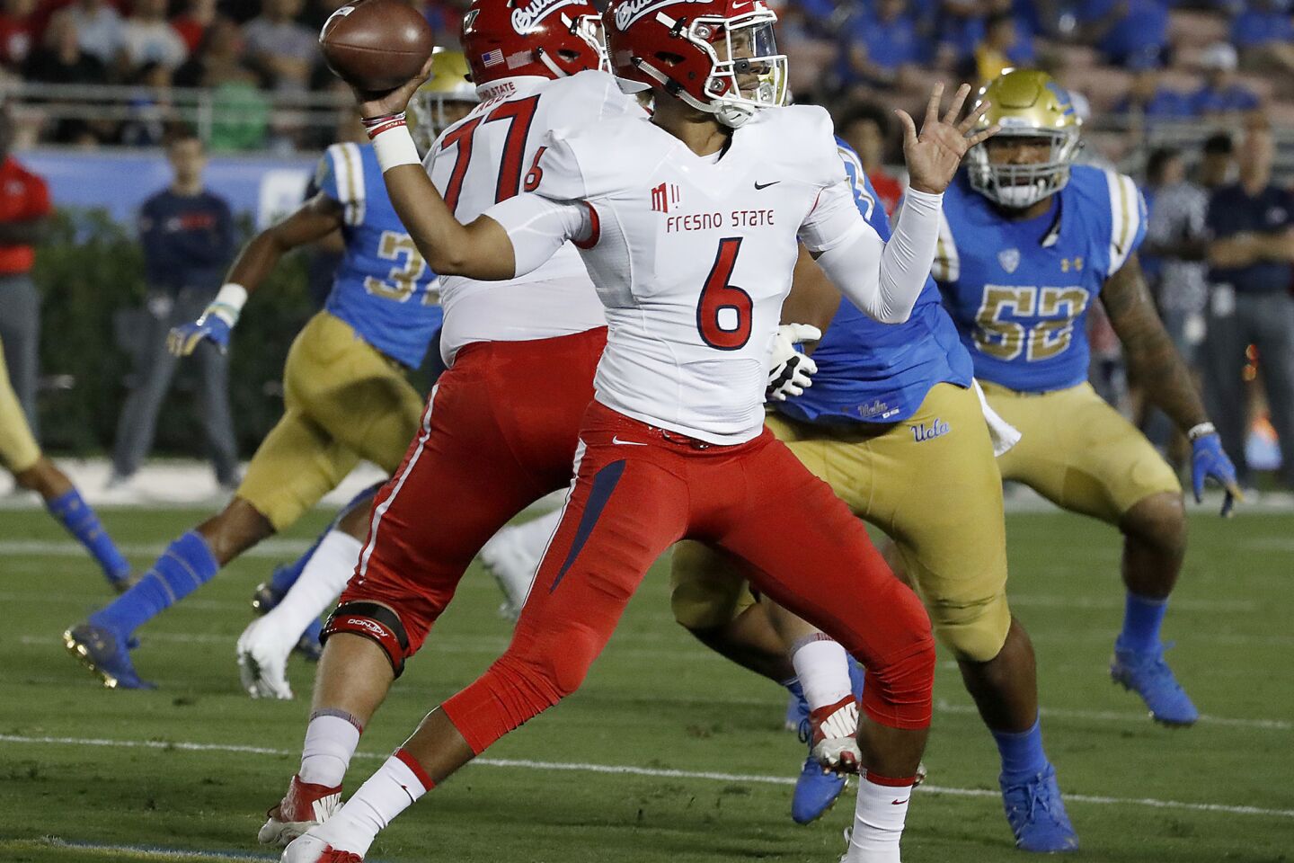 Fresno State quarterback Marcus McMaryion throws downfield against the Bruins in the first quarter on Saturday at the Rose Bowl.