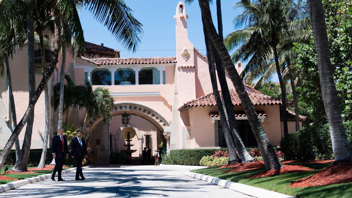 President Trump and Chinese President Xi Jinping at the Mar-a-Lago estate in West Palm Beach, Fla. ( Jim M. Watson / AFP-Getty Images )