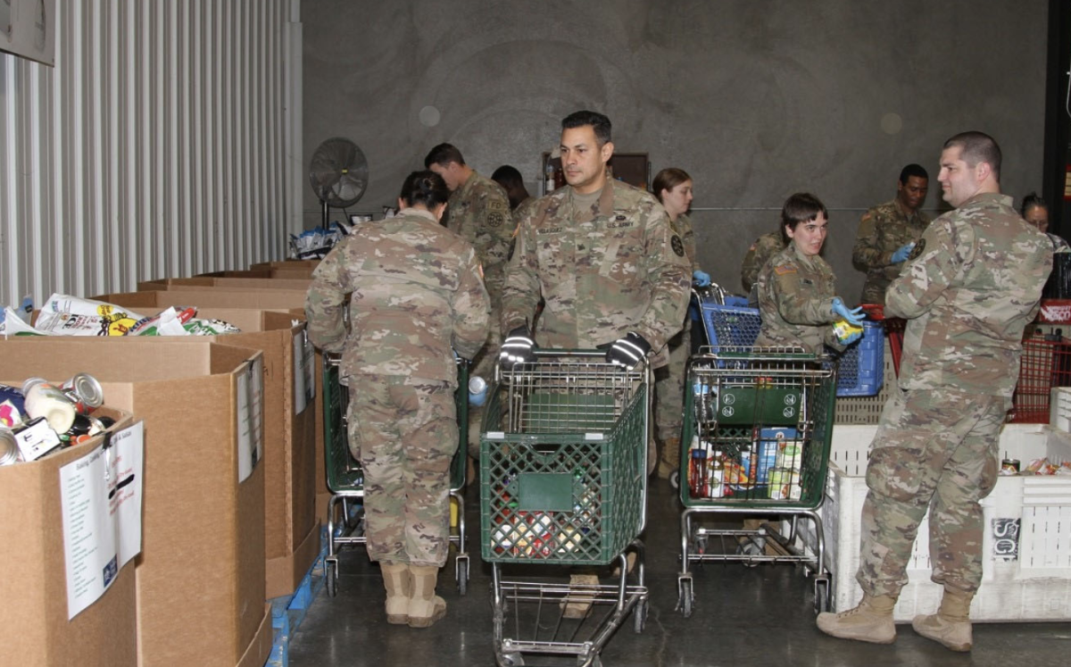 National Guard troops in Sacramento on Monday. The National Guard is helping to distribute food.