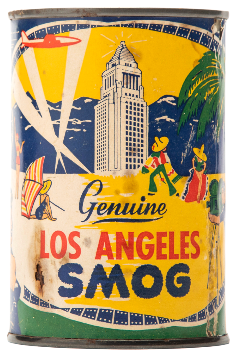 1950s smog souvenir can shows City Hall and L.A. landscape. Text: "Genuine Los Angeles smog."