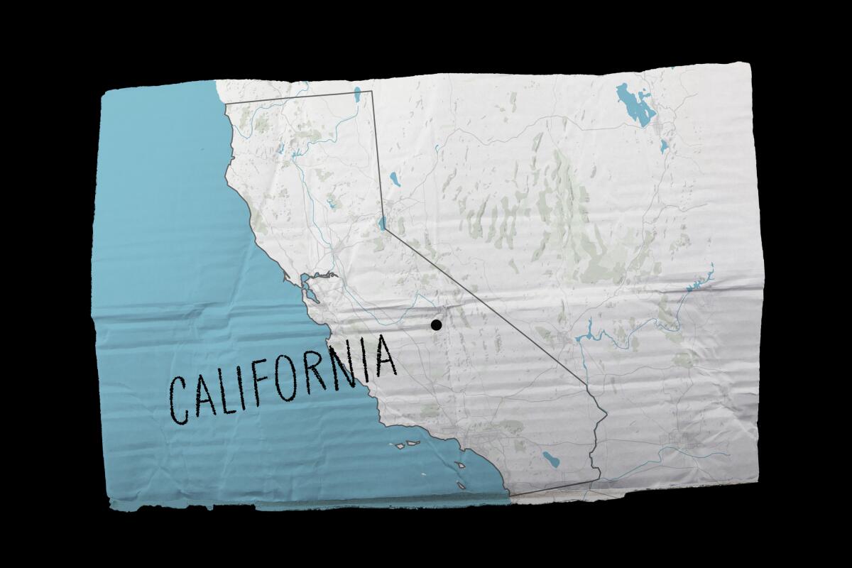 An outline of the map of California on crumpled cardboard.