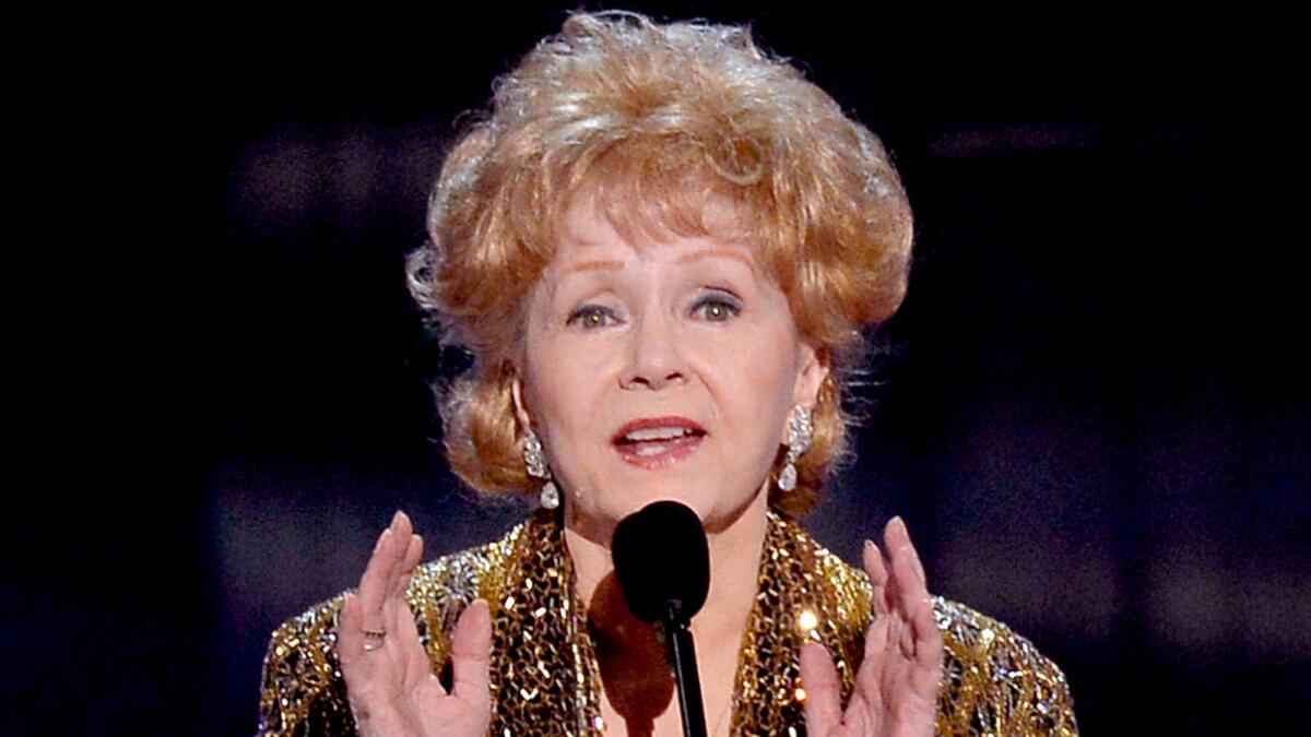 Actress Debbie Reynolds accepts the Life Achievement Award at the 21st Screen Actors Guild Awards.