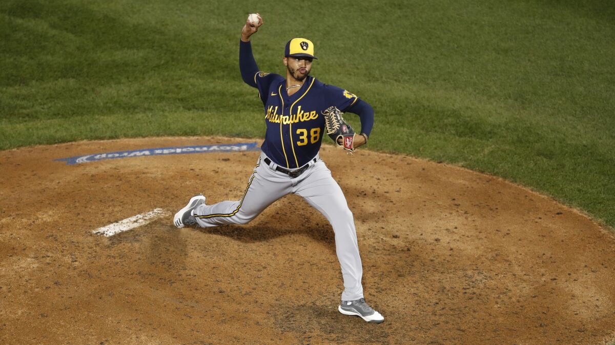 Milwaukee Brewers reliever Devin Williams pitching against the Chicago Cubs 