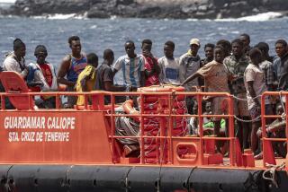 Migrants disembark at the port of on "La Estaca" in Valverde at the Canary island of El Hierro, Spain, Monday, Aug. 26, 2024. Emergency services on Spain's Canary Islands say migrants arrived by boat on the Canary Island of El Hierro on Monday, after a thirteen-day voyage from the coast of Senegal. (AP Photo/Maria Ximena)