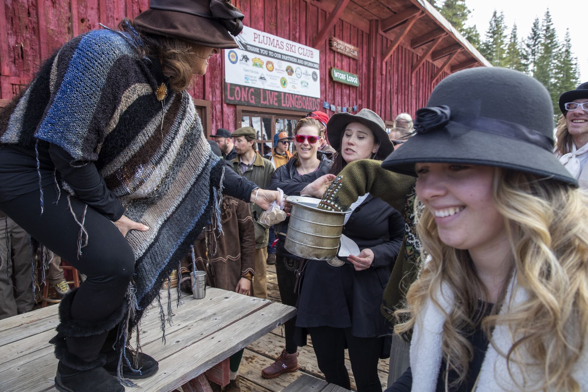 Participants pick numbers out of a bucket