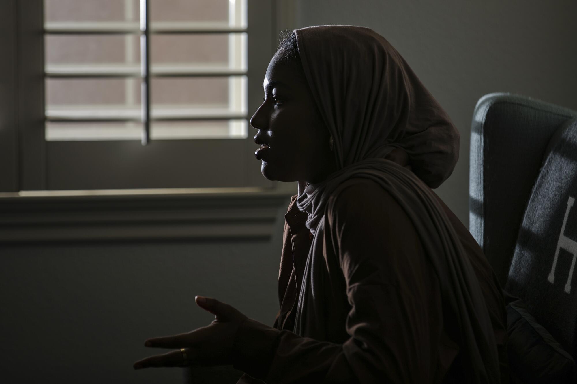 Aissata Ba seen at her home in Aliso Viejo, discusses growing up Muslim in America.