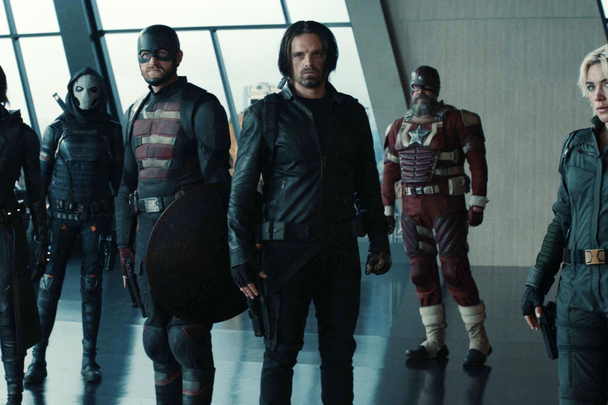 De izquierda a derecha, Hannah John-Kamen, Olga Kurylenko, Wyatt Russell, Sebastian Stan, David Harbour y Florence Pugh