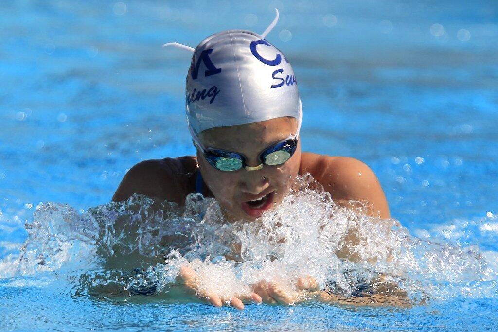 Corona del Mar High's Nicole Lin competes in the girls' 200-yard medley relay during a Pacific Coast League swim meet against University in Irvine on Tuesday.