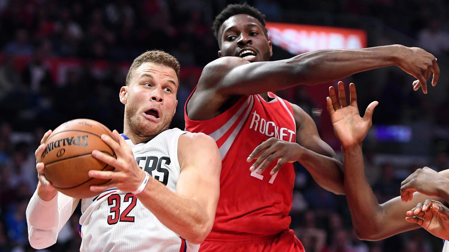 Clippers forward Blake Griffin grabs a rebound from Rockets forward Chinanu Onuaku during the second quarter.