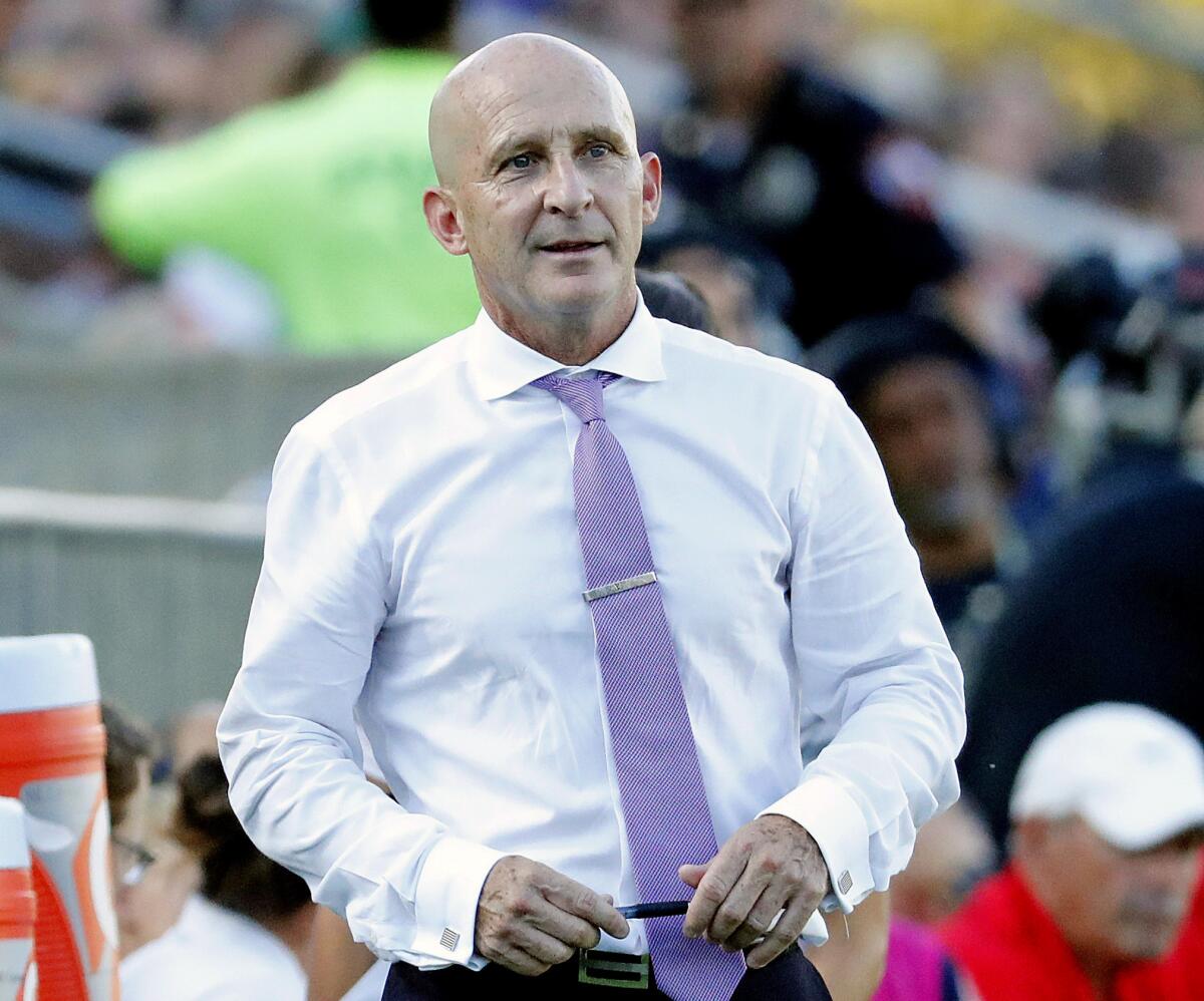 Carolina Courage head coach Paul Riley watches from the sideline during the 2019 NWSL championship soccer game in Cary, N.C. 