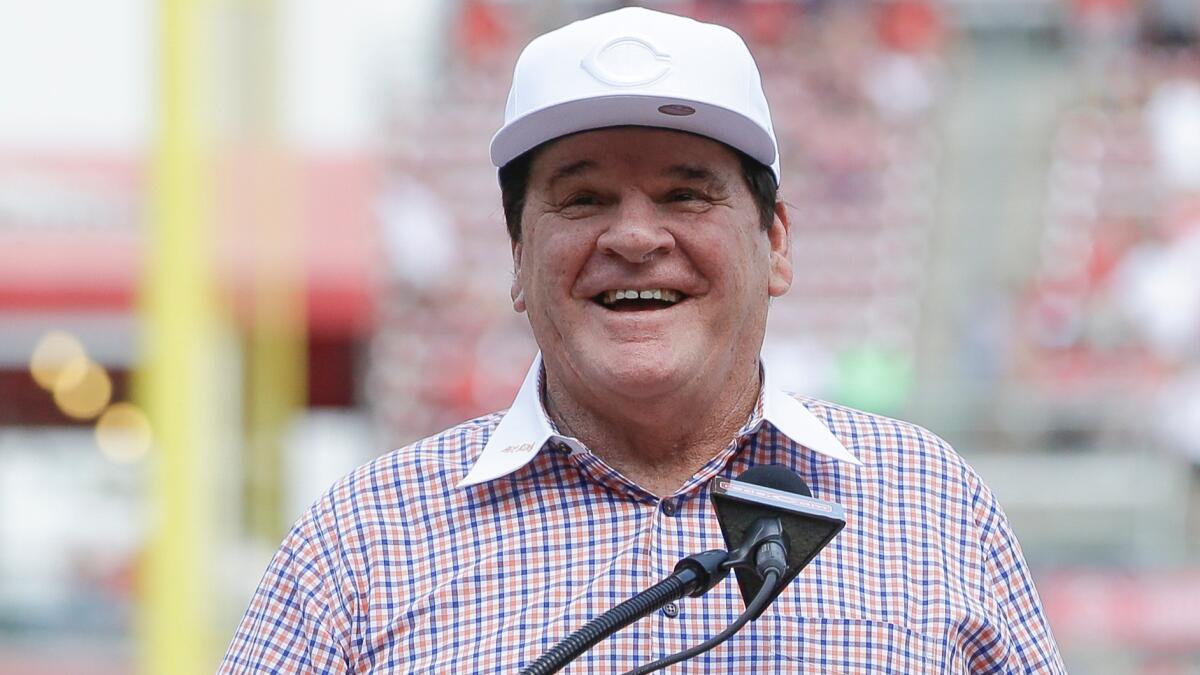 Pete Rose is inducted into the Cincinnati Reds Hall of Fame on June 25.