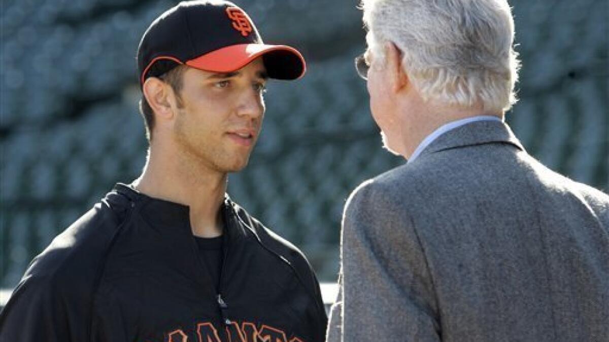 Baseball notebook: Bad back for ace Lincecum