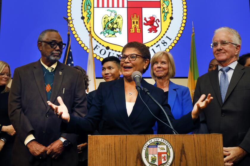 Los Angeles, California -Dec. 12, 2022-On Dec. 12, 2022, Mayor Karen Bass declares a state of emergency against homelessness at the city's Emergency Operations Center, which will allow her to take aggressive executive actions to confront the homelessness crisis in Los Angeles. The declaration will recognize the severity of Los Angeles' crisis and break new ground to maximize the ability to urgently move people inside. From left are Councilmember District 9 Curren Price, Supervisor Janice Hahn, Mayor Karen Bass, and Councilmember District 2 Paul Krekorian. (Carolyn Cole / Los Angeles Times)