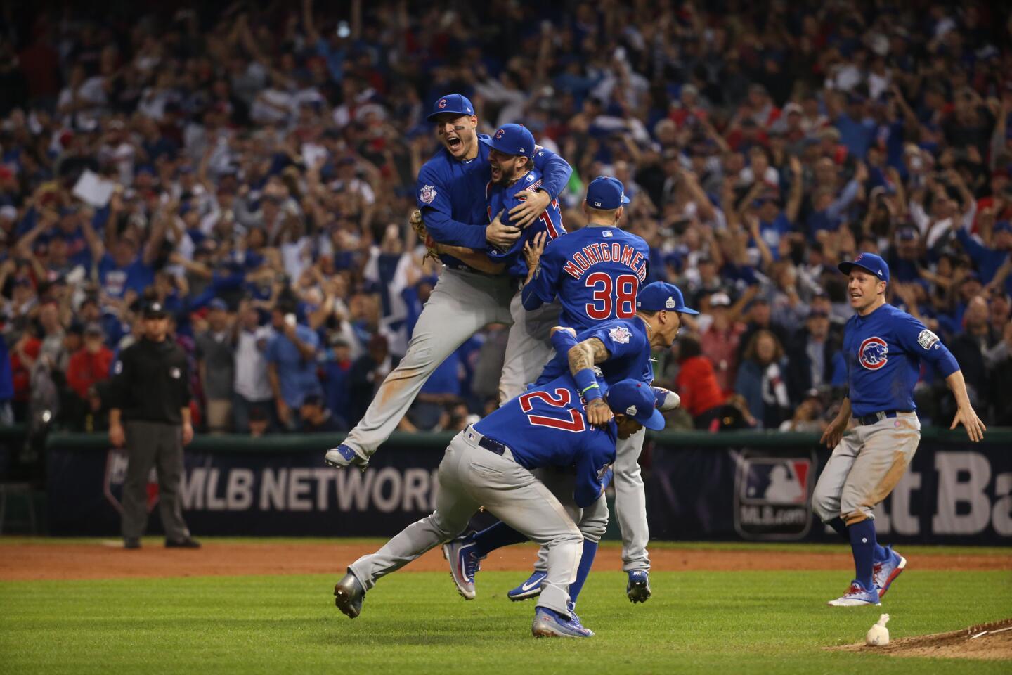 The Chicago Cubs celebrate after beating the Cleveland Indians on Nov. 3 in Game 7 to win the World Series at Progressive Field in Cleveland.