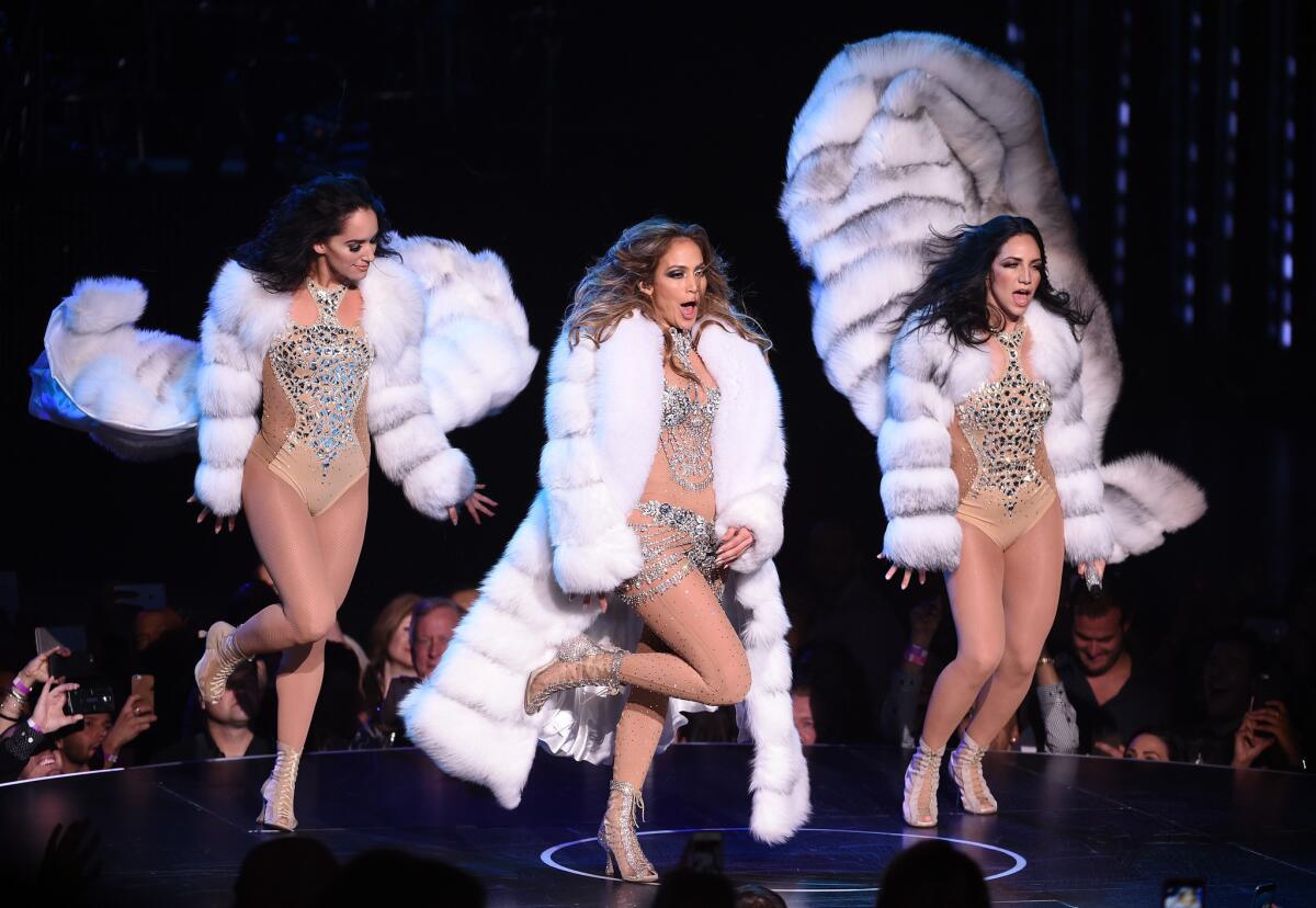 Singer-actress Jennifer Lopez, center, opened her Las Vegas show at Planet Hollywood Resort & Casino on Wednesday.