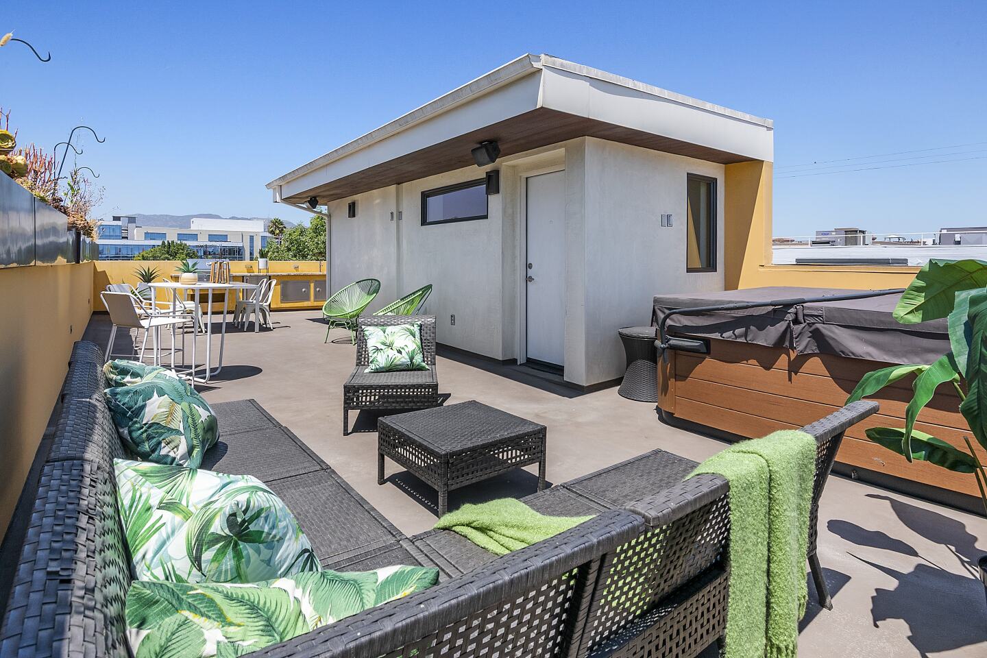 The rooftop deck has a spa.