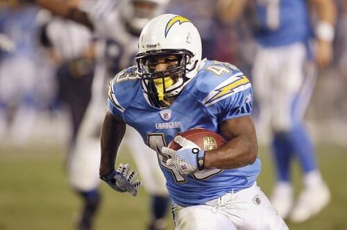 Chargers running back Darren Sproles heads for the end zone on a 22-yard run in overtime on Saturday.