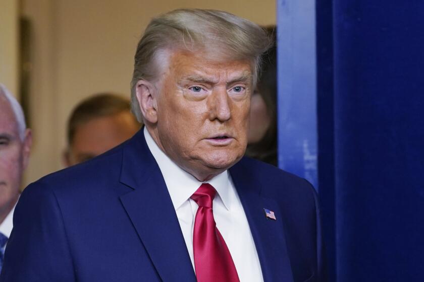 President Donald Trump walking out to speak in the Brady Briefing Room in the White House.