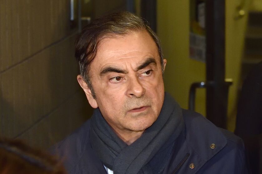 Former Nissan Chairman Carlos Ghosn leaves the Tokyo office of his lawyer on April 3. Ghosn arrived in Lebanon on Monday via Turkey after jumping bail.