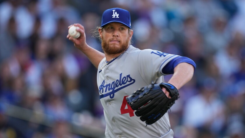 Dodgers reliever Craig Kimbrel pitches against the Colorado Rockies on April 8 in Denver.