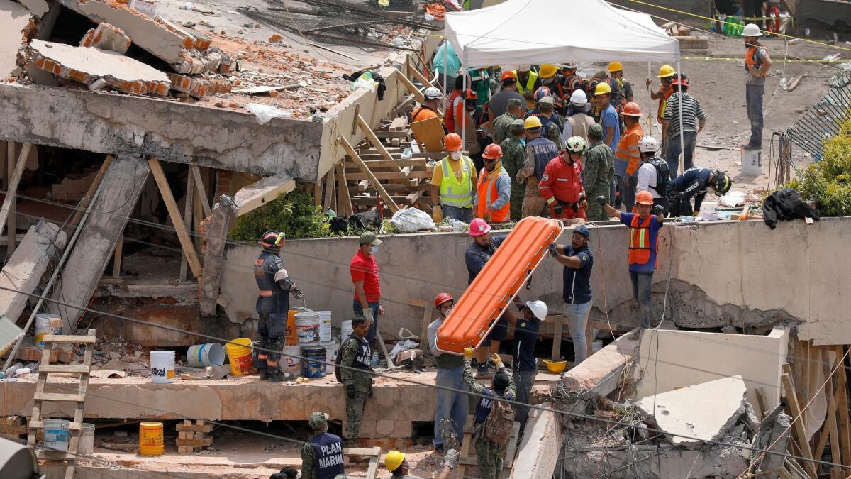The Enrique Rebsamen school collapsed in Mexico City during Tuesday's earthquake. At least 25 bodies were carried out — 21 were students, believed to be 7 or 8 years old.