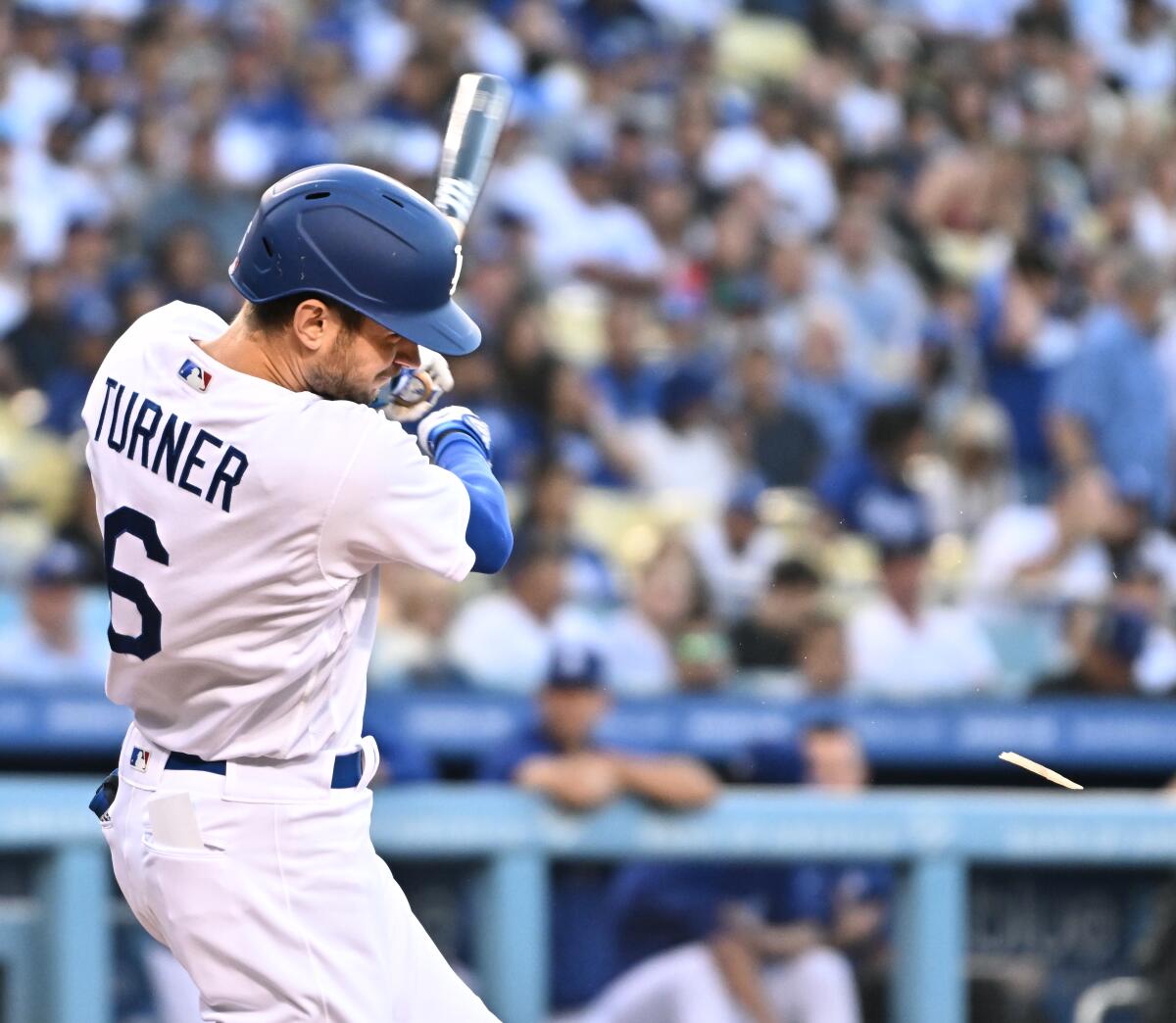 Trea Turner gets a broken-bat single in the first inning.