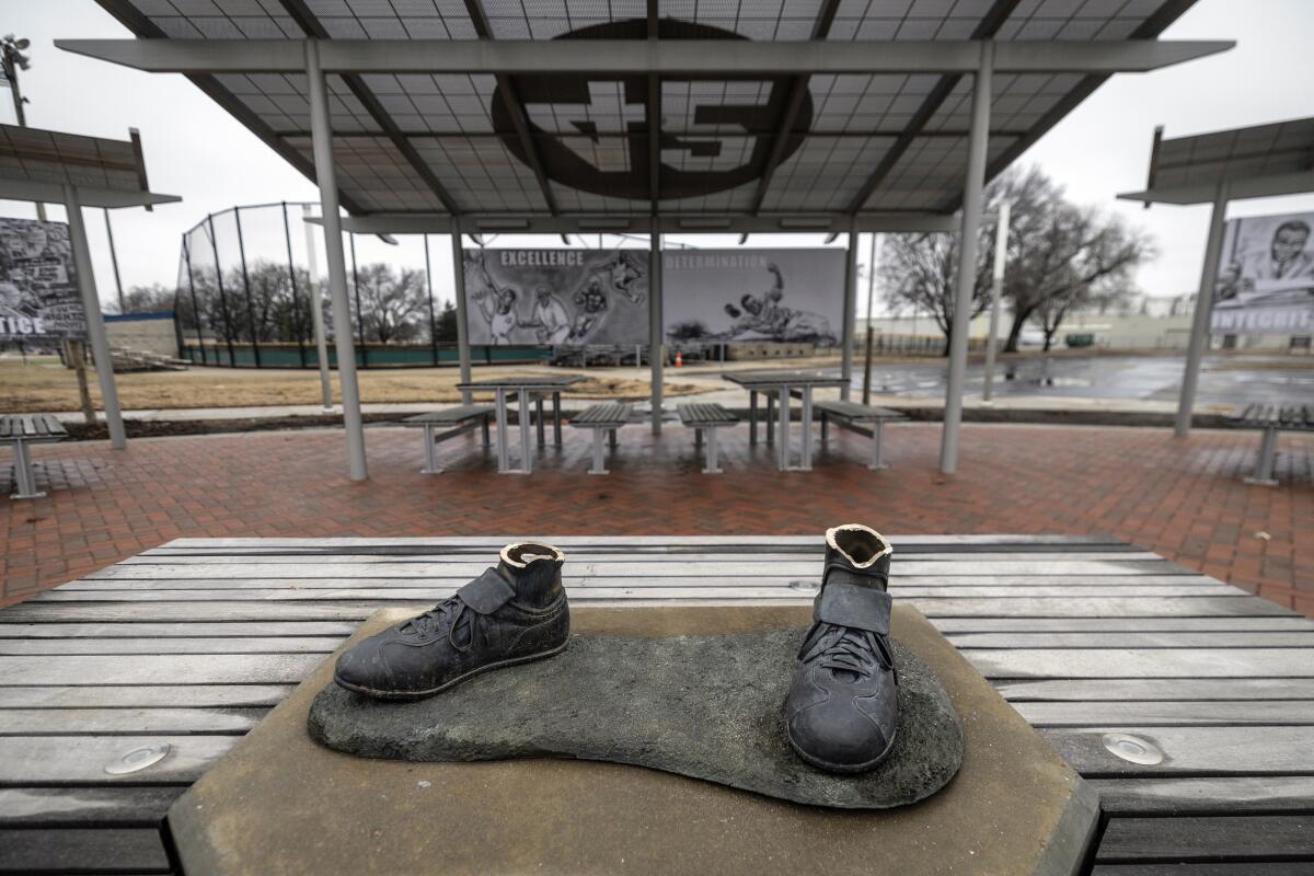 Bronze feet are left behind after a statue of Jackie Robinson was stolen.