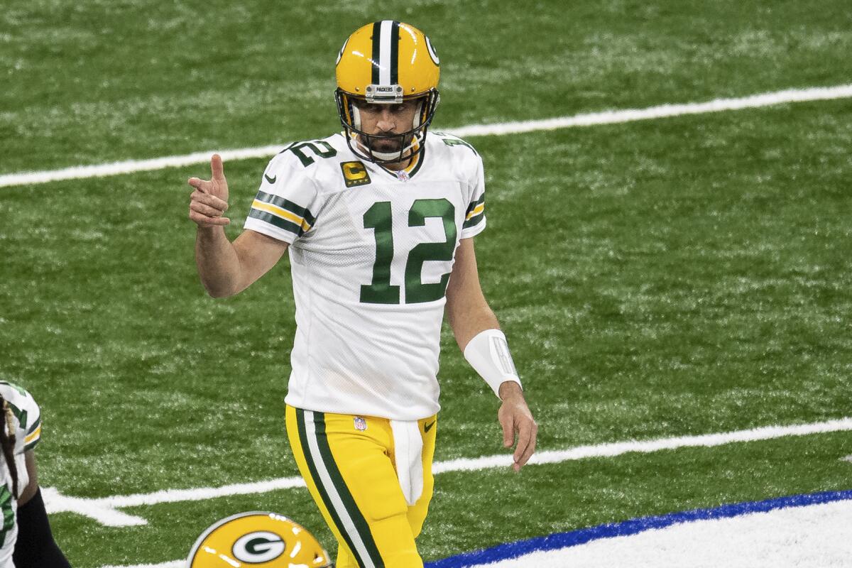Green Bay Packers quarterback Aaron Rodgers signals to the sideline against the Indianapolis Colts on Sunday.